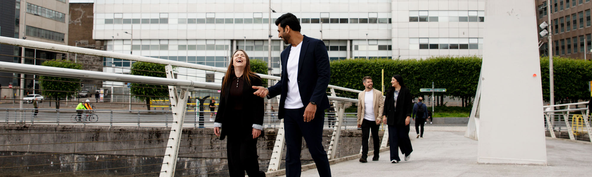Colleagues walking along the River CLyde